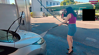 Sexy Girl Next Door in Jeans Skirt and High Heels Washes Her Car