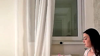 Cute Beauty Big Tits Big Ass College Girl Braless with the Shortest Pink Skirt on the Bed Shows Her Panties