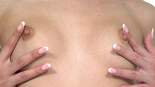 Fortuna Kubera with small tits fucks her vagina solo