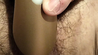 Masturbating